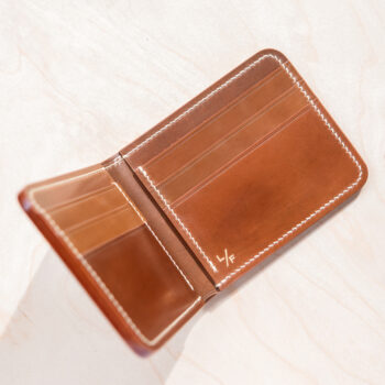 Six-slot bifold in Horween shell cordovan leather.