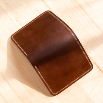 Exterior of a compact bifold in bourbon shell cordovan.