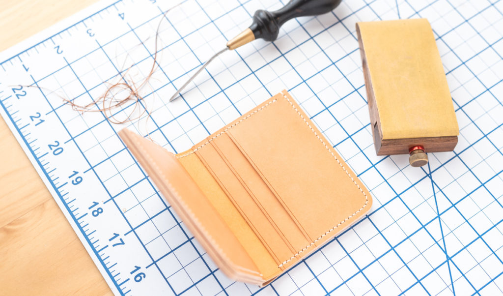 Natural Butter bifold being made