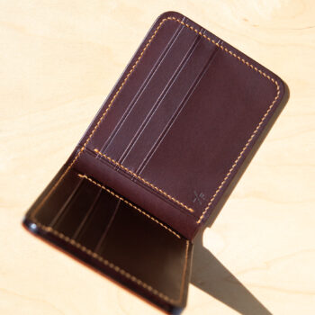 Leather wallet in natural and tobacco brown.