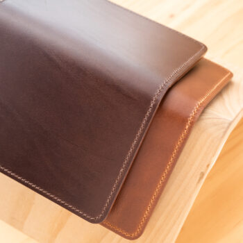 Two leather passport wallets.