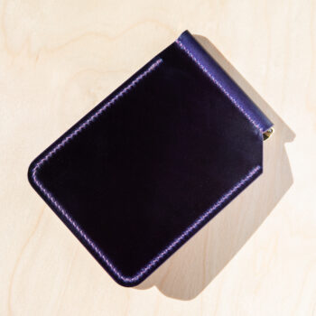 The exterior of a purple leather wallet.