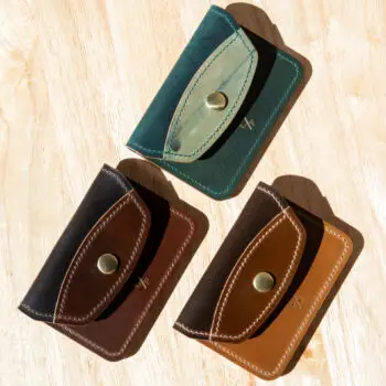 Three shell cordovan wallets in a range of colors